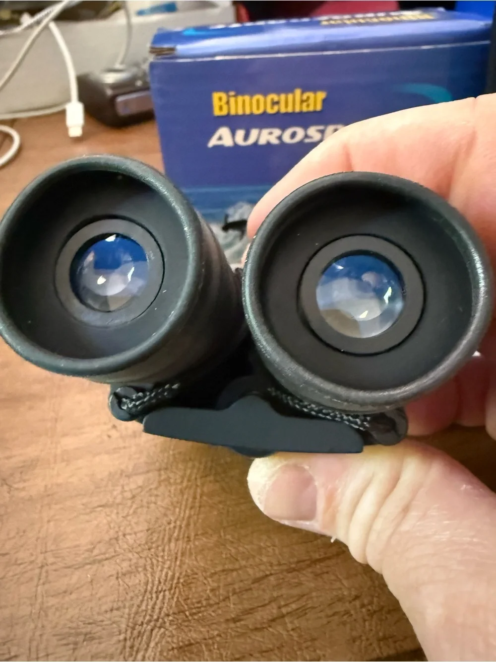 Aurosports 30x60 folding binoculars with a carrying case and cleaning cloth